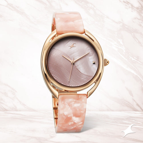 Fastrack Younique Quartz Analog Pink Color Mother Of Pearl Dial Acetate And Metal Strap Watch For Girls NT68036KD01