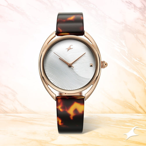 Fastrack Younique Quartz Analog Mother Of Pearl Dial Acetate And Metal Strap Watch For Girls NT68036KD02